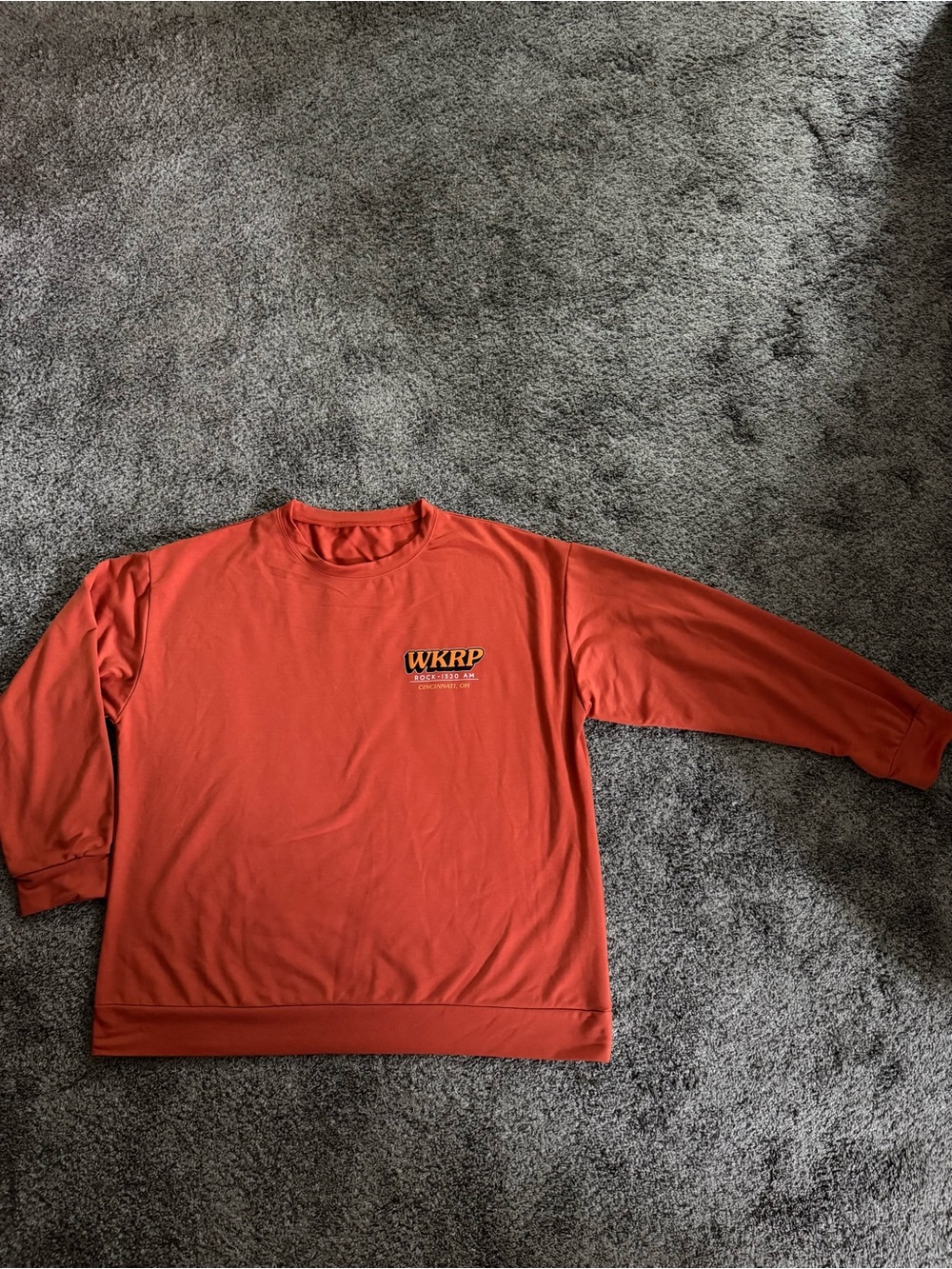 Men's WKRP Cincinnati Turkey Drop Crewneck Sweatshirt in Orange